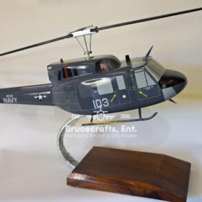 Model of UH-1N Twin Huey US NAVY 103 Aircraft with detailed craftsmanship.